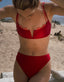 Mia swimsuit top by Arraï Studio: red with pink details.